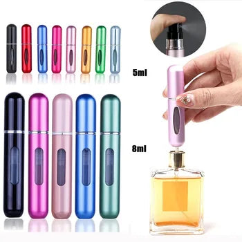 Set of colorful perfume bottles with a hand holding one, next to a larger perfume bottle.