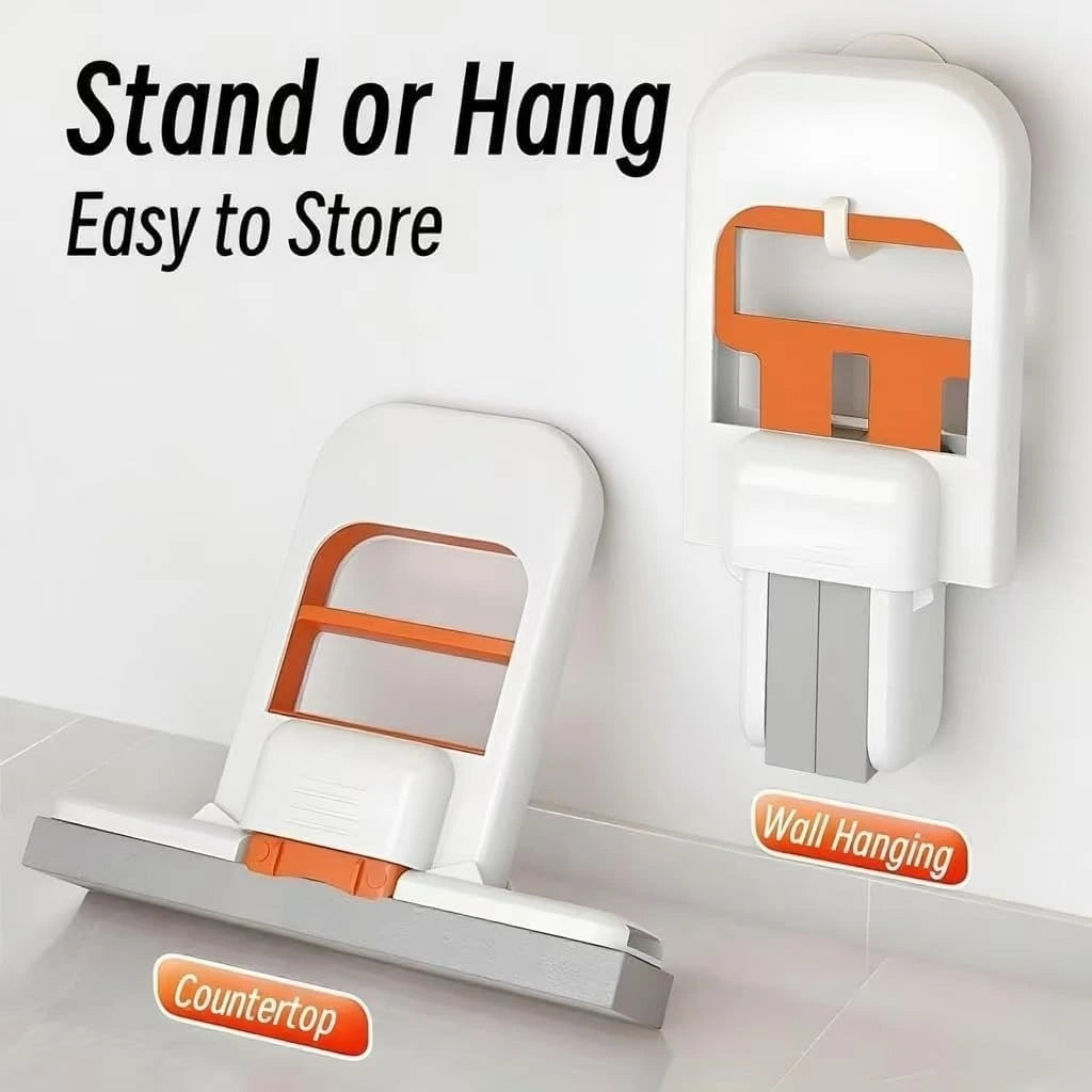 White and orange kitchen tool with 'Stand or Hang' and storage options on a white background