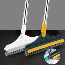 Two cleaning brushes with different bristle designs on a dark surface.