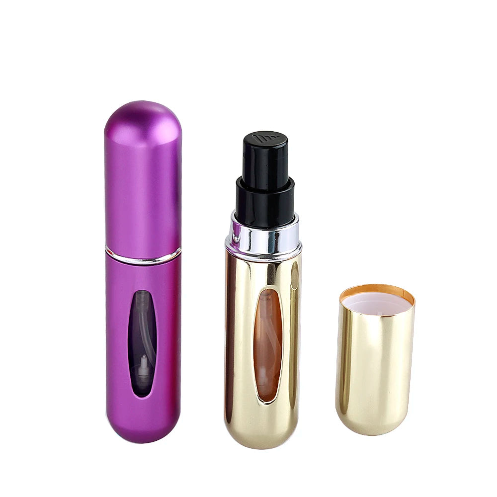 Three metallic bottles with different colors on a white background