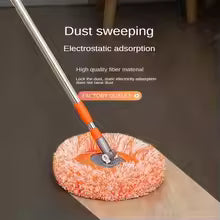 Dust sweeping tool with electrostatic adsorption technology on a wooden floor.