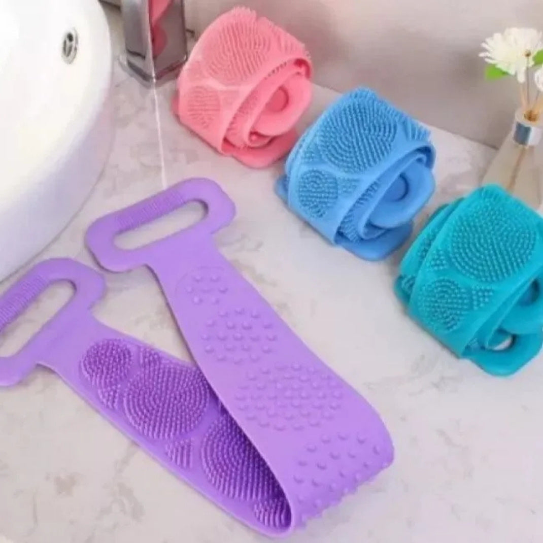 Colorful silicone scrubbers on a bathroom counter with water running from a faucet.