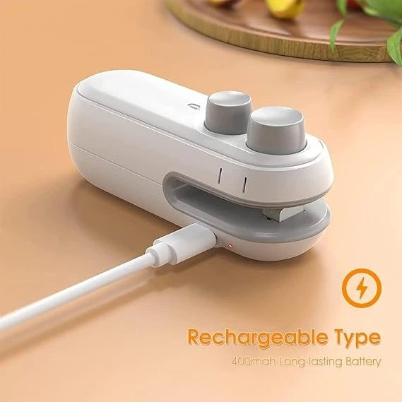 White and gray electronic device with USB cable on a beige surface, labeled 'Rechargeable Type'.