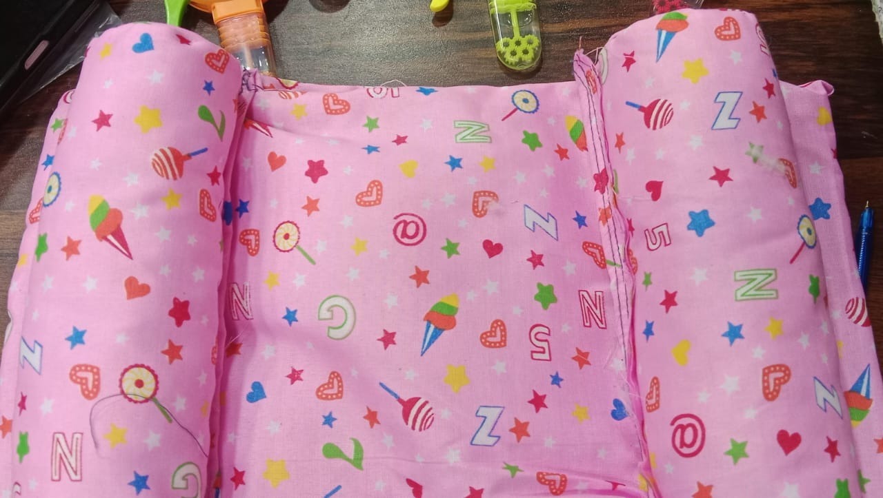 Soft and breathable adjustable infant pillow for comfortable head support.